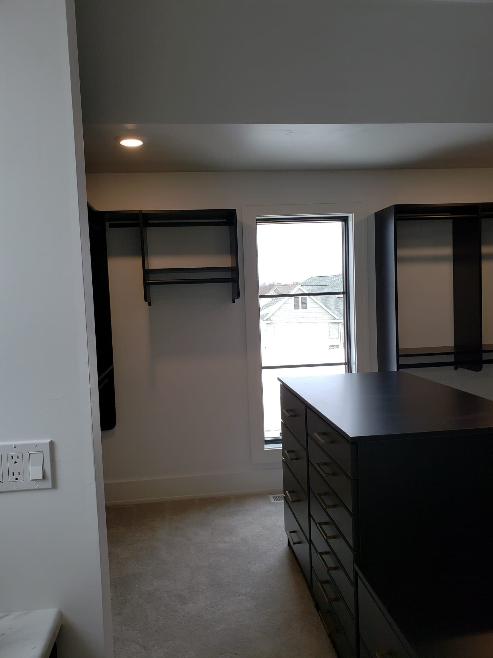 Walk-In Closet Portfolio: Black Island Closet with Window Wall