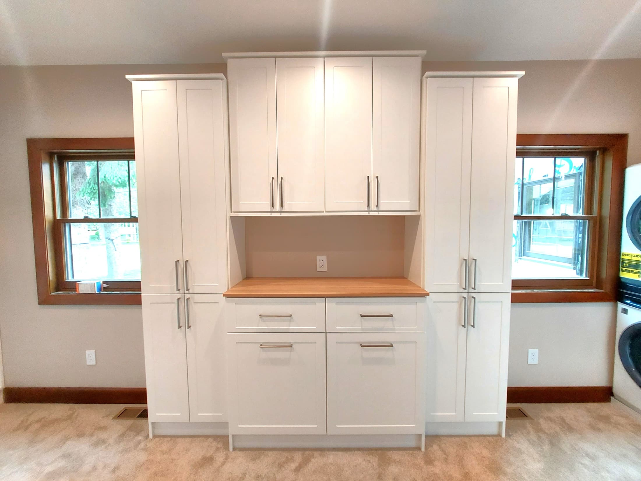 Laundry Room Portfolio: 13 — Symmetrical White Laundry Wall