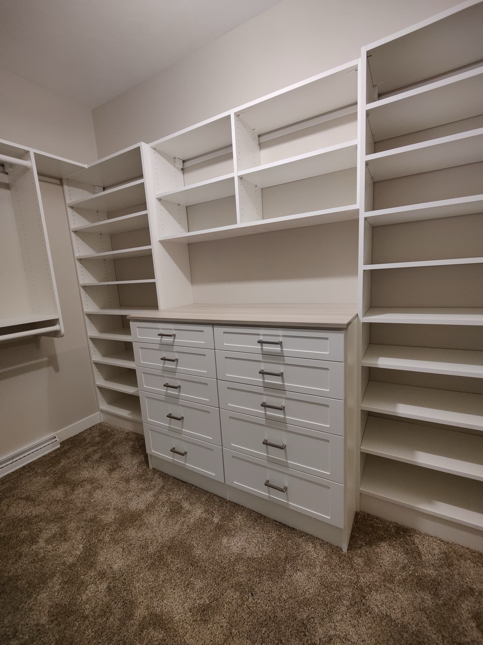 Walk-In Closet Portfolio: Modern White Closet with Open Cubbies