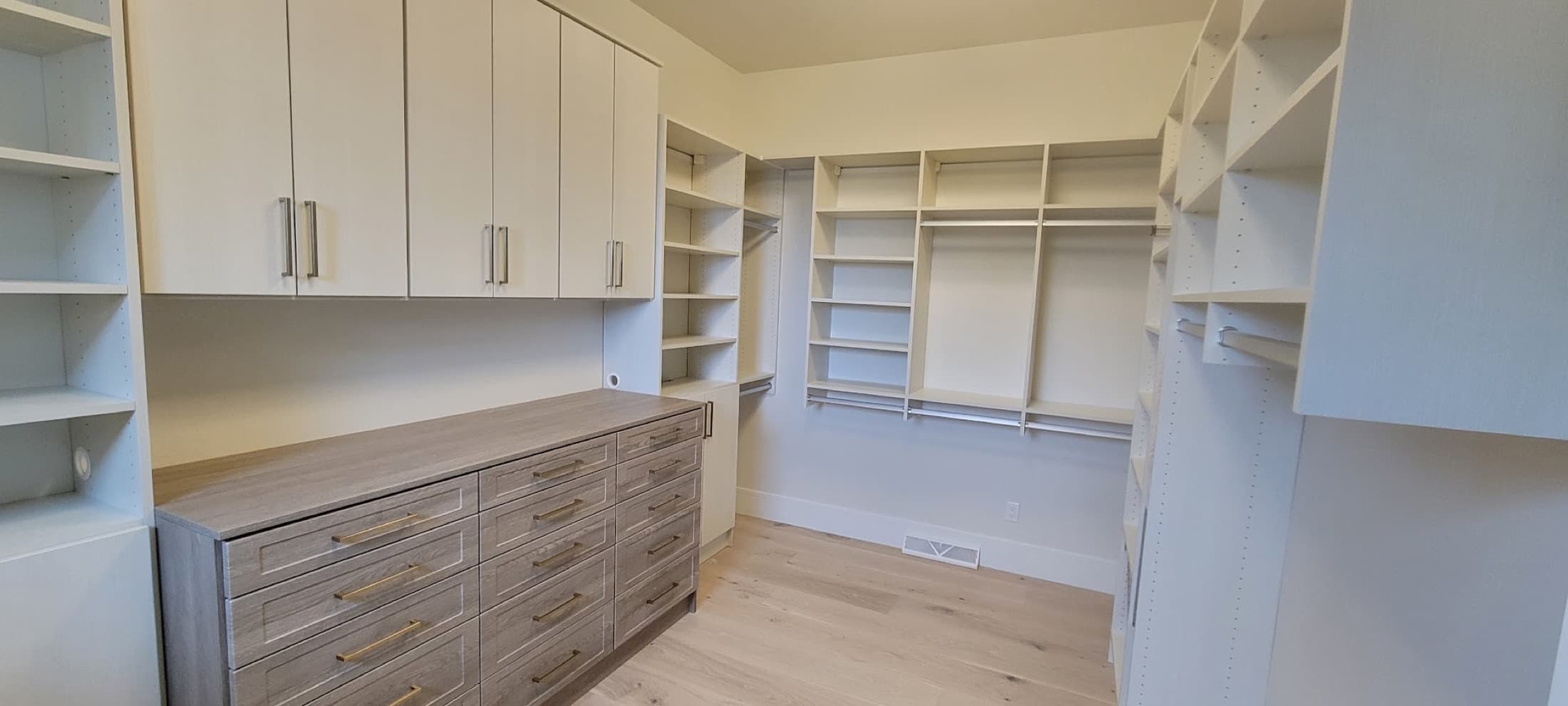 Walk-In Closet Portfolio: Two-Tone Walk-In with Dresser Island