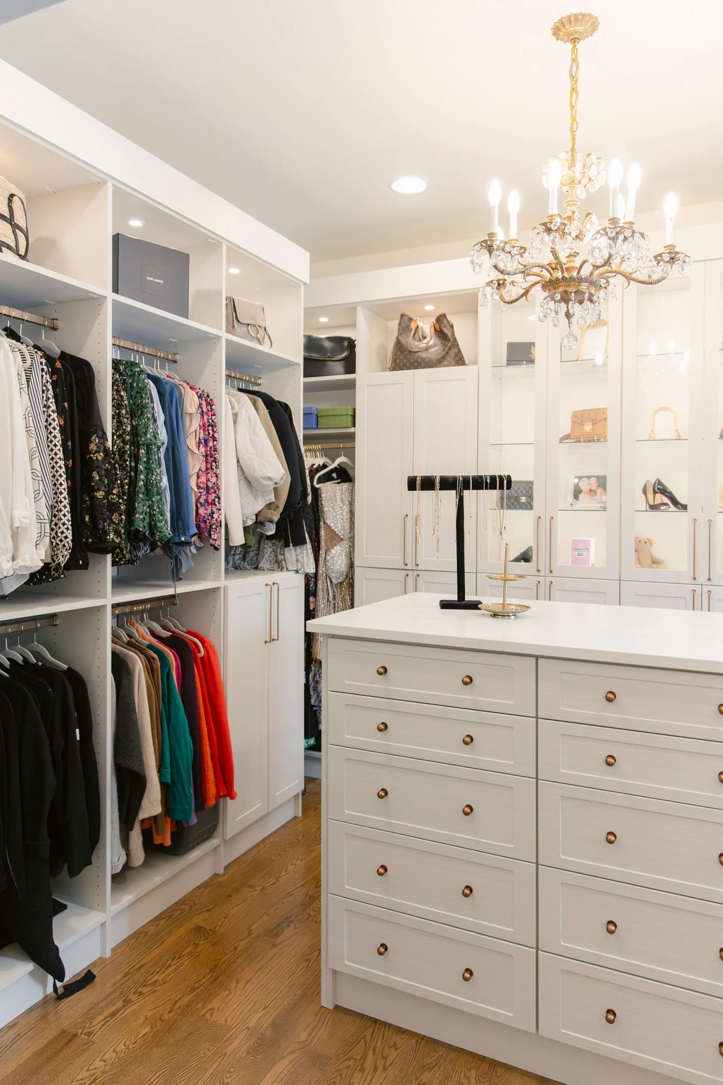 Custom walk-in closet with built-in storage and central island