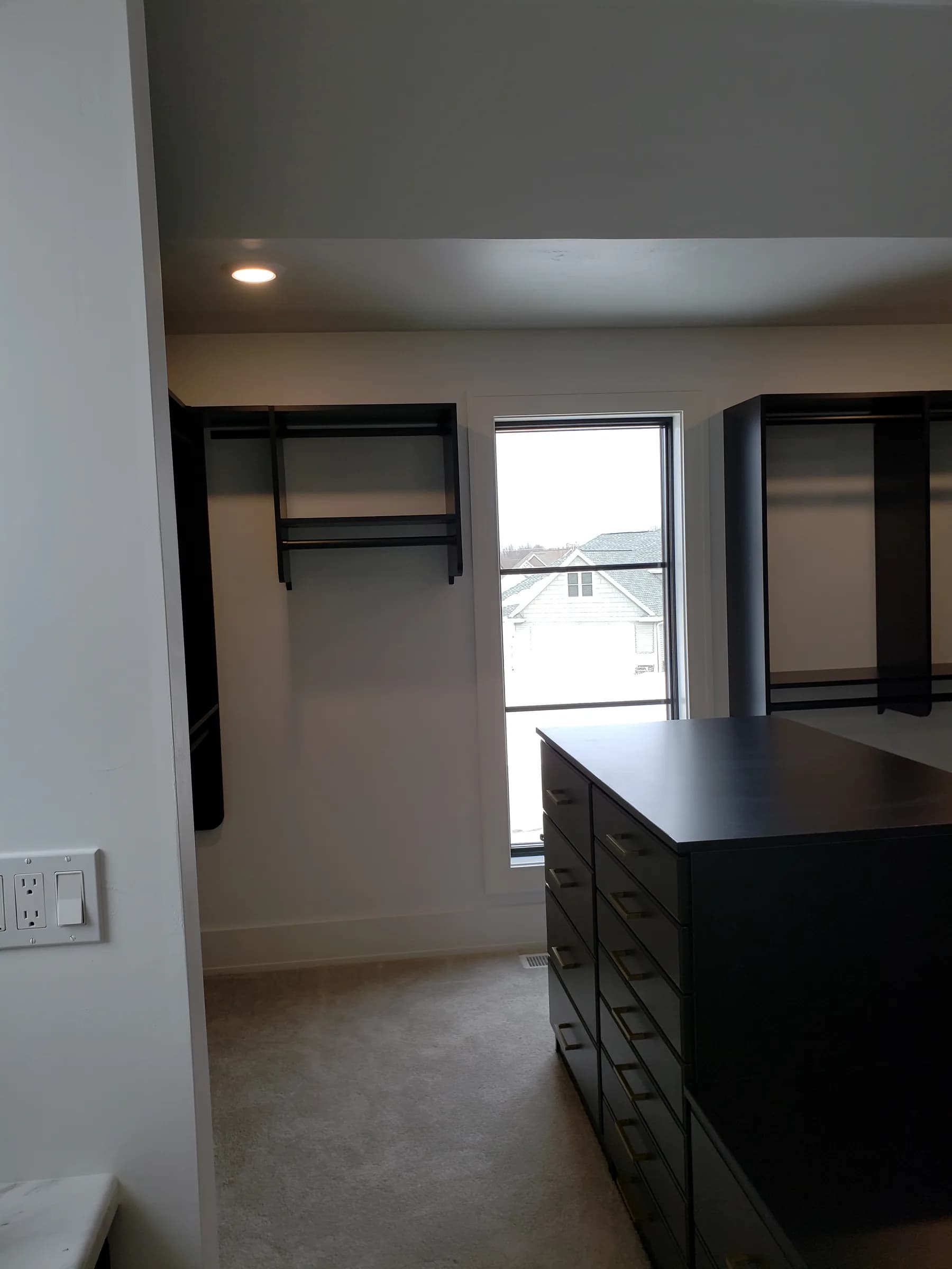 Black Island Closet with Window Wall