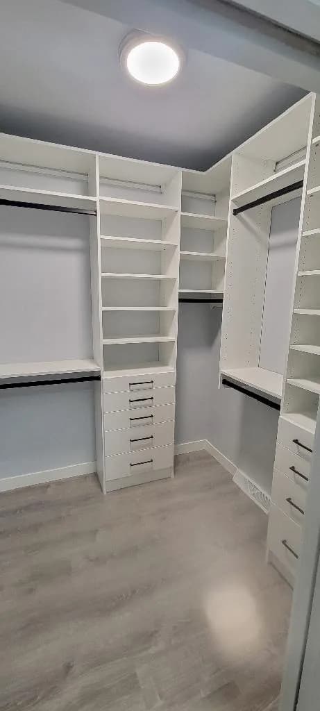 Ceiling-Height White Walk-In with Black Hardware