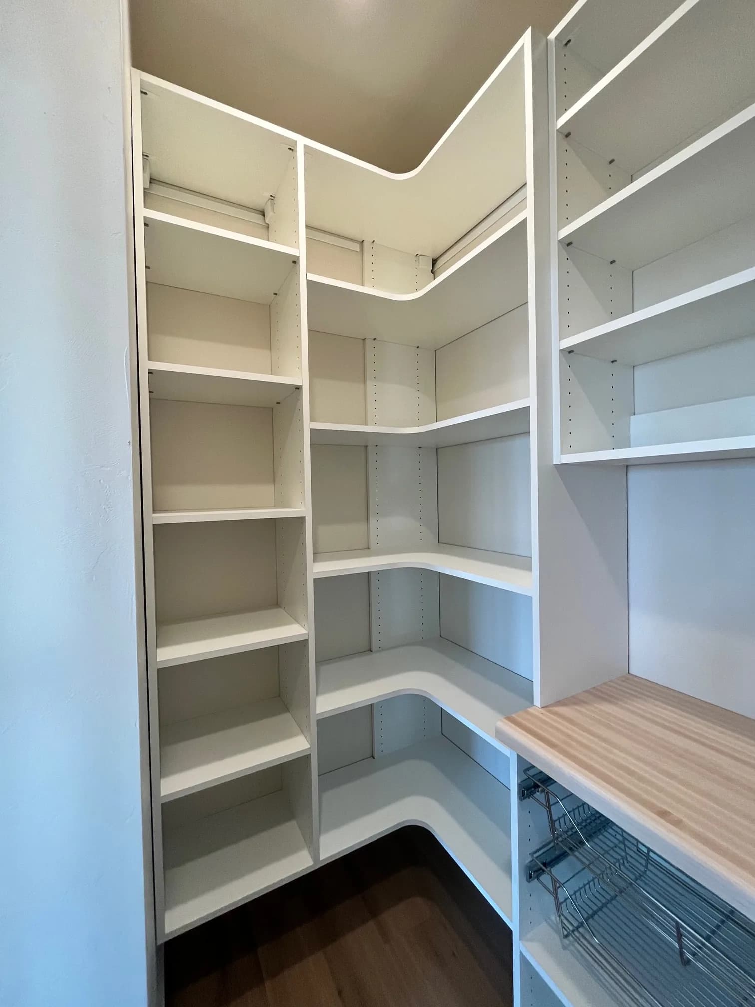 Curved-Corner White Pantry with Pull-Out Baskets
