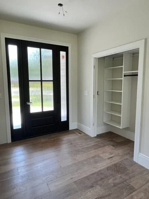 Foyer Reach-In beside Black Entry Door