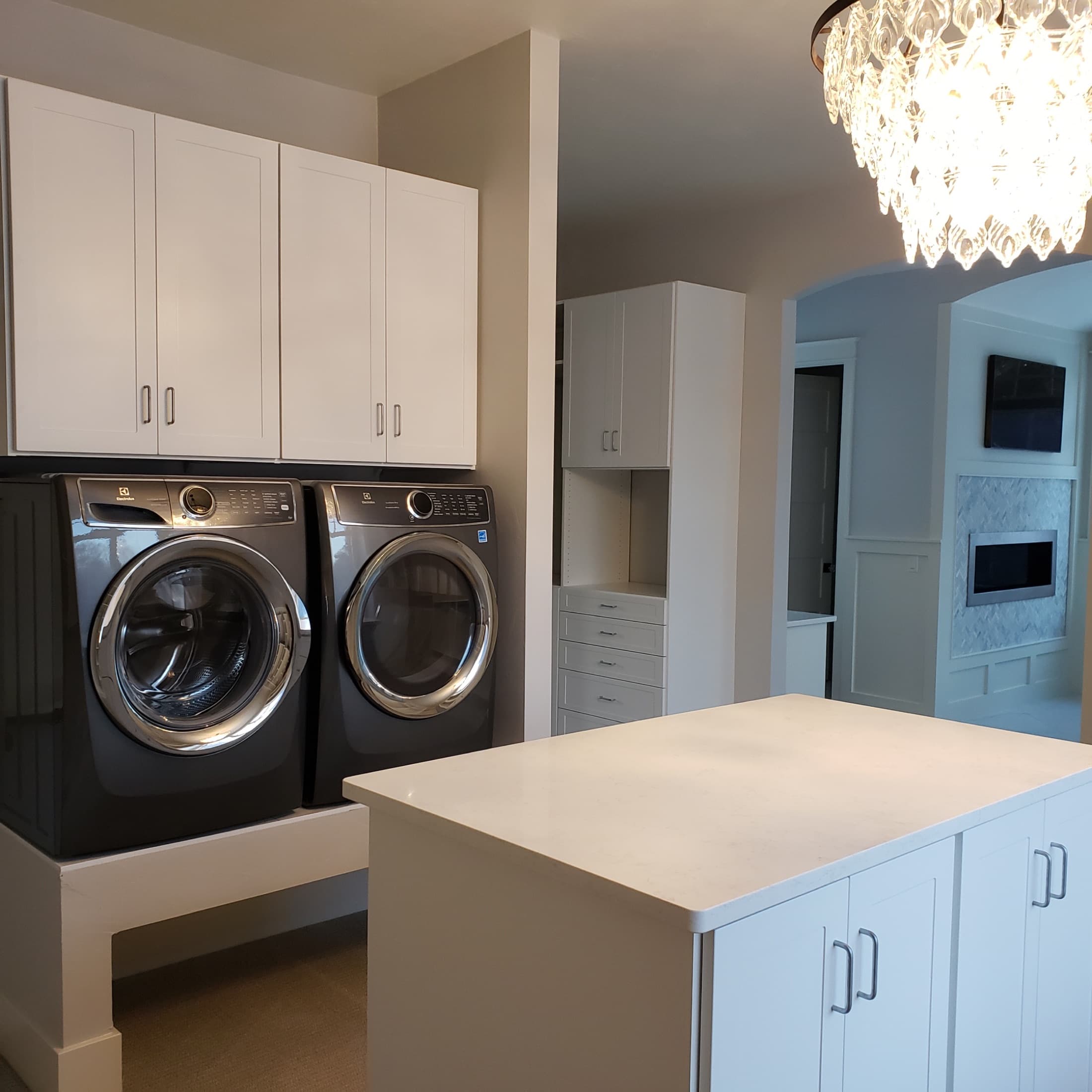 Laundry Room Portfolio: 064 — Compact Custom Closet with Shelving Tower