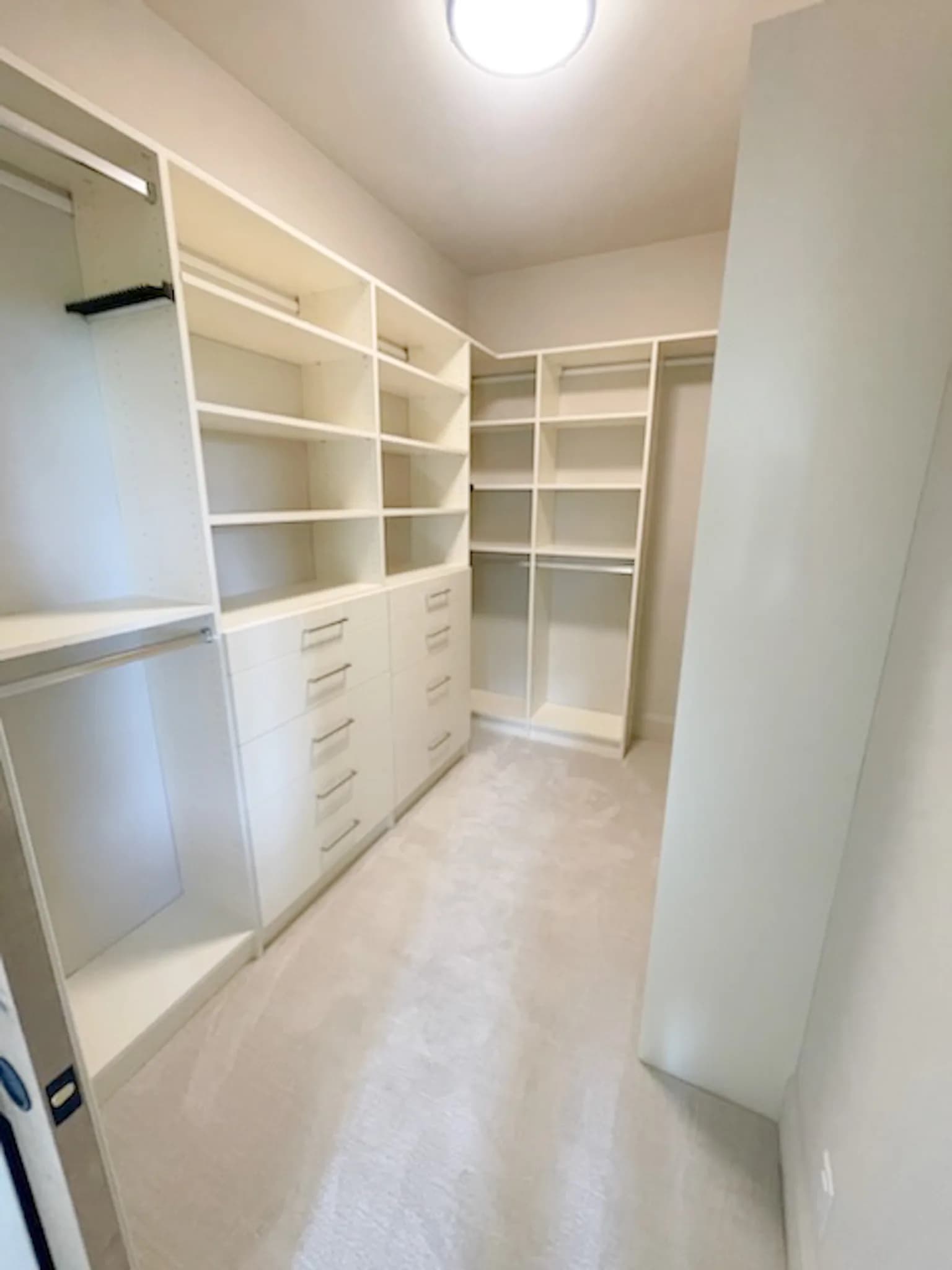 White Storage Wall with Long-Hang Bay